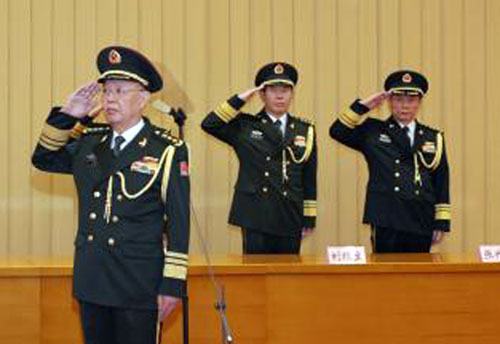 Chinese officers in salute